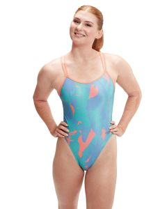 Woman with hands on hips wearing Speedo Allover Digital Starback Banana Leaf Swimsuit - Blue / Pink