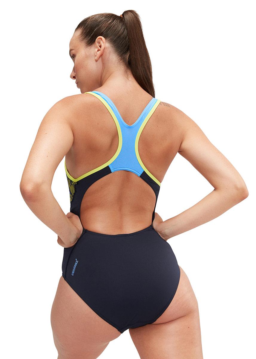 Front view of lady wearing Speedo Placement Laneback Swimsuit - Navy Blue / Lemon
