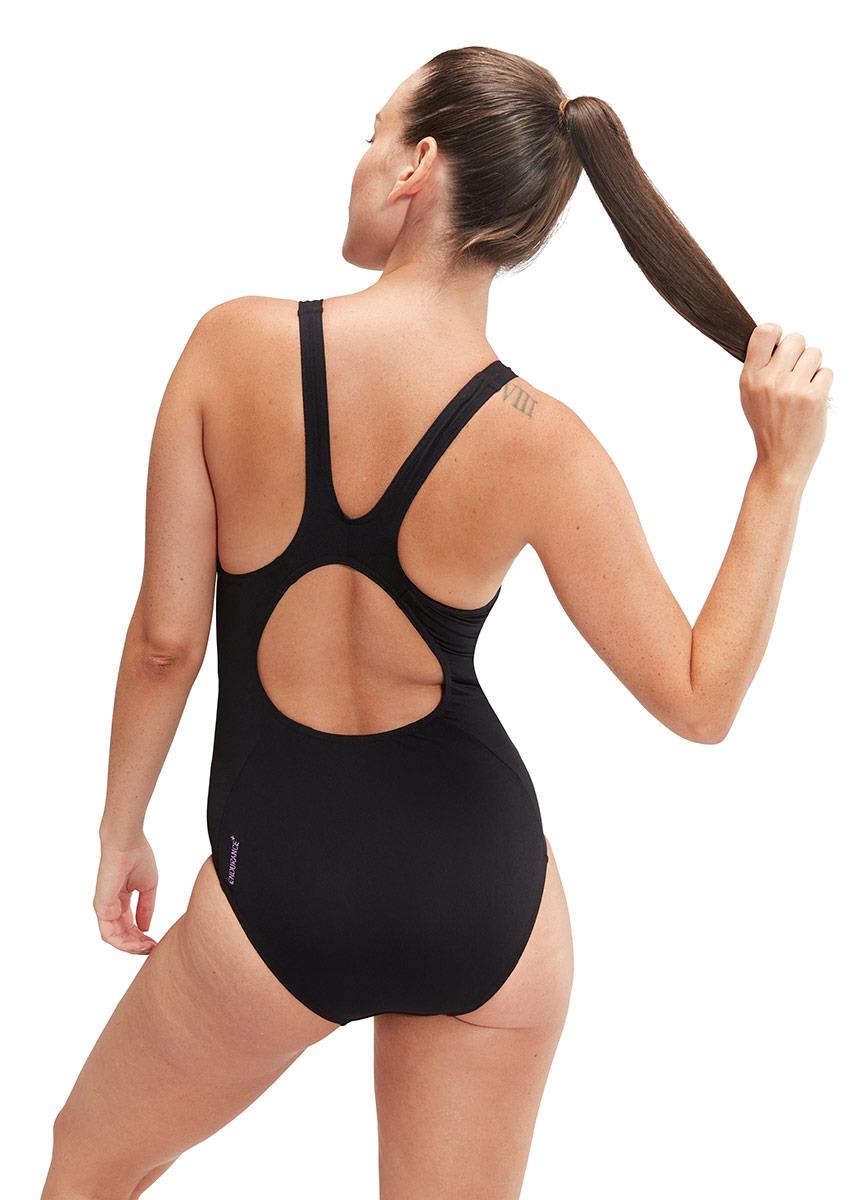 Front view of lady wearing Speedo Placement Muscleback Swimsuit - Navy / Purple / Green
